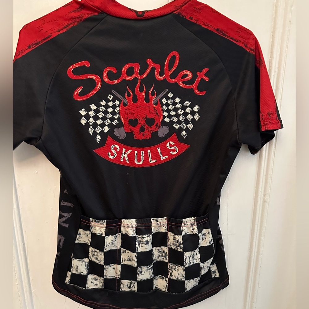 Women’s lot: 2 Twin Six cycling jerseys, size Med plus 1 Velocio size L